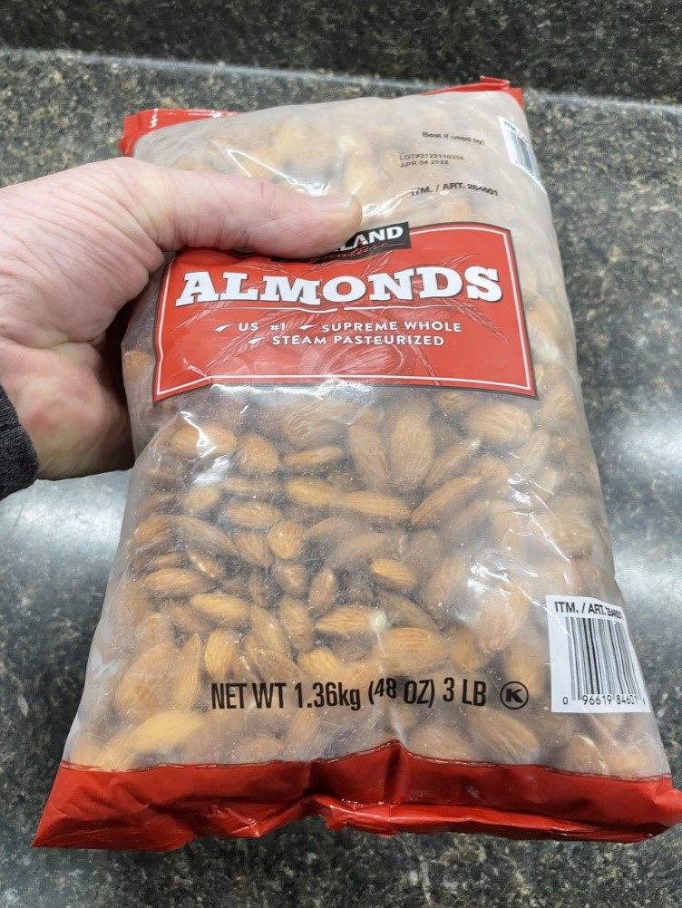 A 3lb bag of Kirkland Signature almonds.